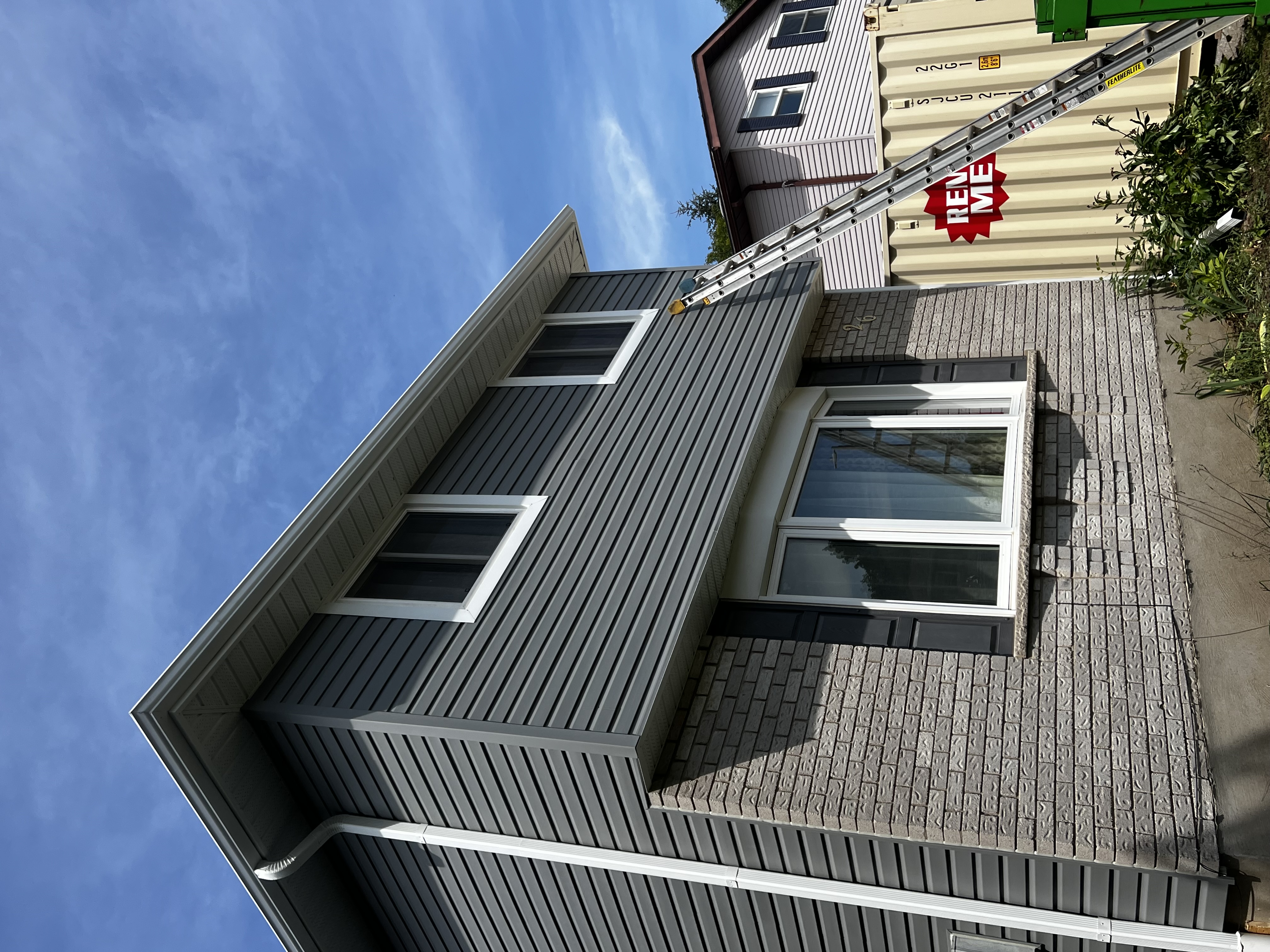 Plywood, strapping, siding, soffit, facia & Trough in Guelph — after photo